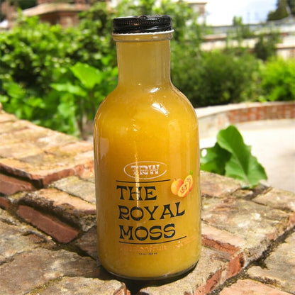 The Royal Moss passion fruit sea moss drink outdoors